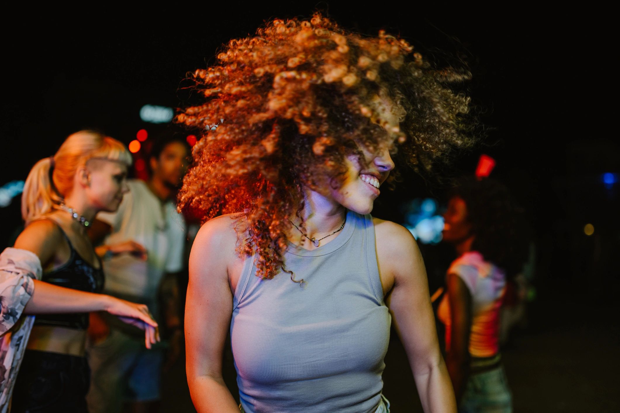 Nightclub dance moment with vibrant energy